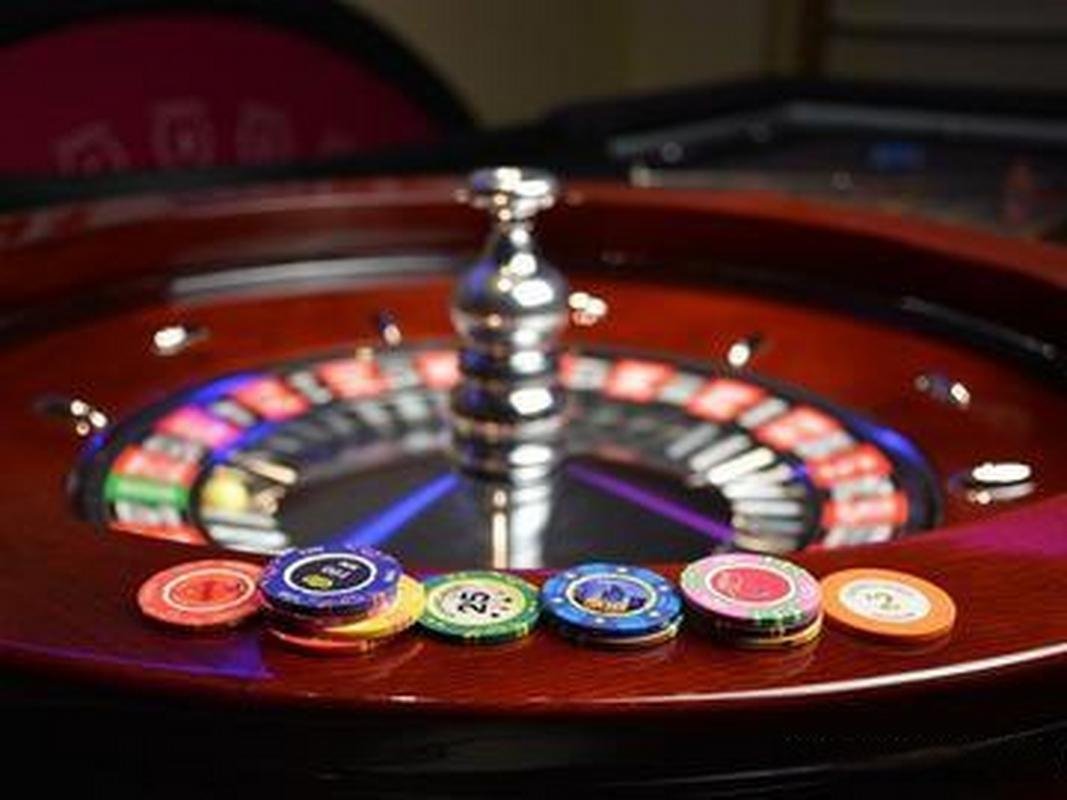 Speed Baccarat table with multiple betting positions and dealer